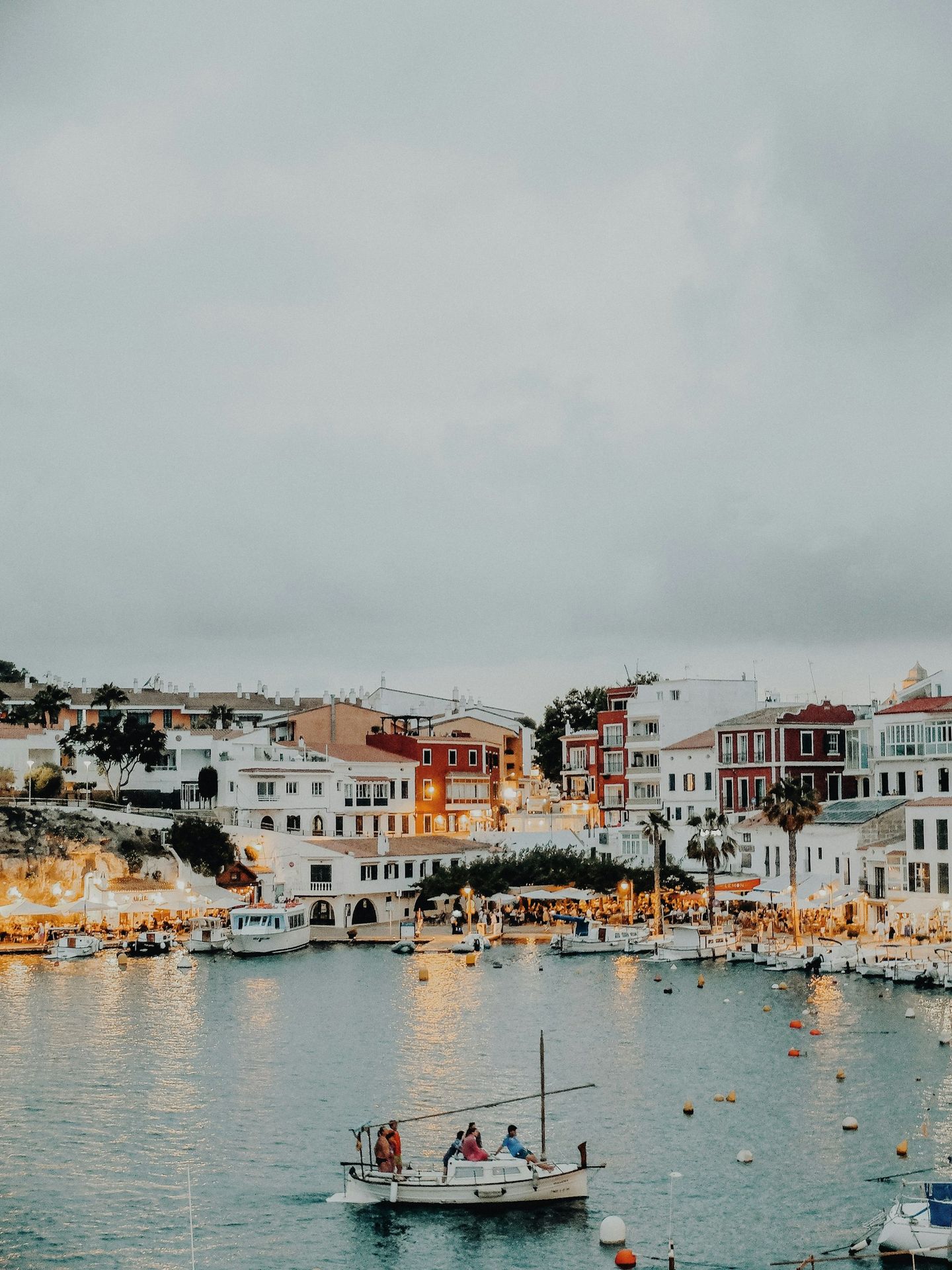 A harbor filled with lots of boats on top of water